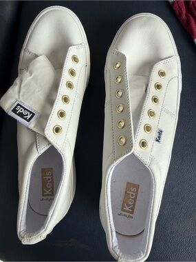 Keds Slip-On Sneakers in Cream with Gold Eyelets